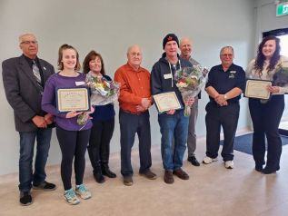 Members of South Frontenac Council honoured local volunteers at a special lunch on December 10. From left to right: Mayor Ron Vandewal, Youth Volunteerism recipient Samantha Pringle, Councillor Charlene Godfrey, Deputy Mayor Ron Sleeth, Dedication recipient Karl Hammer, Councillor Steve Pegrum, Councillor Norm Roberts, and Good Neighbour recipient Laura Embleton.